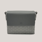 Gray handbag with woven pattern on a light gray background
